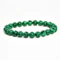 Natural green malachite beaded stretch bracelet for men and women daily fashion wear. - Malachite