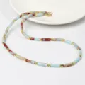 Kleurrijke halfedelstenen kralenketting met gouden tussenstukken, elegant design. - Amazoniet Blauw