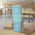 Stainless steel coffee cup with silicone sleeve, mint green travel mug for daily commuting. - 1773 Green