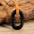Bohemian black oval stone pendant with brown suede cord necklace, versatile ethnic style jewelry. - Black Stone
