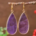 Elegant teardrop amethyst gemstone earrings with gold-plated bezels and secure hooks. - Teardrop / Amethyst