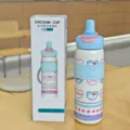 Stainless steel dual-drink vacuum water bottle detail view, 600ml portable student straw cup. - 600ml / Blue