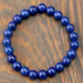 Blue gemstone bead stretch bracelet for women, elegant natural stone beaded jewelry item. - Lapis Lazuli