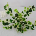 Artificial ivy vine plant for home wall decor, green fake leaves hanging garland for indoor room. - White & Green Sweet Potato Leaves