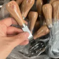 Stainless steel potato masher with cute bear paw design wooden handle for baby food. - Plastic