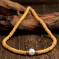 Gele polymeer klei schijf choker ketting met centrale parel en gouden afstandhouders SKU - Geel Oranje Parel