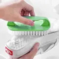Plastic household cleaning brush with soft bristles for scrubbing shoes and clothes easily. - Green