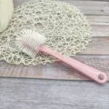 Pink multi-functional long handle shoe cleaning brush with durable white bristles, pink color. - Pink