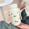 Simpatica borraccia termica in acciaio inox con filtro tè e pois per le donne. - 1000ml / Orso a Pois / Bianco