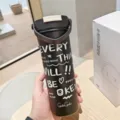 Tragbarer Edelstahl Isolierbecher mit Tragegriff und Doppelfunktionsdeckel für Kaffee. - 610ml / Schwarz