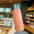 Tragbare Edelstahl Vakuum isolierte Wasserflasche mit Griff in leuchtendem Orange. - TS8823 Stil / 480-600ml / Orange