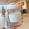 Portable glass coffee cup with silicone sleeve and convenient handle strap for daily use. - 420ml / White