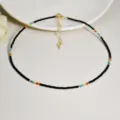Collana girocollo fatta a mano con perline colorate, design arcobaleno semplice ed elegante. - Nero