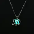 Silver-tone hollow elephant cage pendant necklace with glowing luminous stone for women. - Light Blue Glow