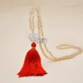 Champagne crystal beaded long necklace with white peace charm and bright red tassel style. - Champagne Red Tassel Style (N2457-02)