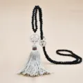Long black beaded crystal sweater necklace with white peace sign pendant and tassel variant - Black Crystal Beige Tassel Style (N2457-03)