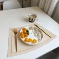 Minimalist faux leather placemat waterproof oil-proof table mat for modern dining decor. - Embroidered Edge Pearl White