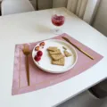 Pink faux velvet waterproof leather placemat with elegant gold border for luxury dining table decor. - Embroidered Border Rose Pink