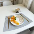 Grey waterproof leather placemat heat insulation table mat for modern dining room decor - Embroidered Edge Silver Stone Gray