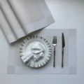 European PVC placemat set, non-slip heat insulation table mat, woven dining plate mat detail. - White Single Frame