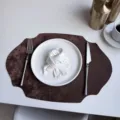 French style leather placemat, oval faux velvet insulation pad in brown color variant. - Coffee