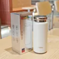 Compacta mini botella térmica, taza de vacío portátil con revestimiento interior de titanio. - 180ML / Blanco
