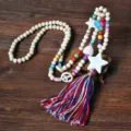 Collana con nappa di perline di legno boho con dischi colorati e ciondoli turchese. - Collana Multicolore (N2351)