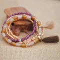 Pulsera de cuentas multicapa bohemia para mujer con borlas y diseño de cuerda elástica. - Café