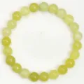 Natural stone round bead stretch bracelet in light green, simple and elegant everyday jewelry. - 8mm / Lemon Jade