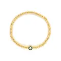 Primer plano de una pulsera de cuentas de oro de 18k con un ojo turco verde sobre blanco. - Estilo Verde (JSS240029C)