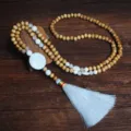 Handmade wooden bead long necklace variant with elegant white tassel and stone pendant - Round Style