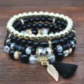 Conjunto de pulseras de cuentas multicapa con cristal, cuentas doradas y borla. - Negro (B1521-04)