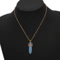Gold-tone chain necklace featuring a light blue hexagonal crystal pendant for women. - Light Blue Hexagonal Cylinder Crystal Pendant Necklace (N2103-05)