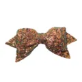 Detail close-up of sparkling golden brown sequin bow accessory, showing delicate shimmering texture. - Sequins No. 18 Golden Yellow