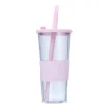 Detail view of the clear double wall plastic tumbler with pink silicone sleeve and matching straw. - 24oz / Pale Purple