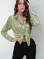 Women's sage green satin long sleeve button down shirt with front tie lapel design. - Light Green