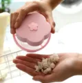 Roze pruimenbloesem wasmachine drijvende pluis filter net zak haarvanger handig hulpmiddel. - Blauw