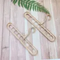 Beige Kunststoff 9-Loch Zauber Kleiderbügel multifunktional klappbar Kleiderschrank Halter - Nordic Rosa