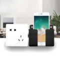 Wall-mounted phone charging holder adhesive storage box for smartphone and remote control. - Black