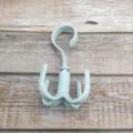 Multifunctional 4-claw rotating plastic hanger hook for wardrobe storage of bags and ties. - Nordic Blue