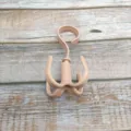 Four-claw rotating plastic hook for wardrobe storage, organizing bags, ties and belts. - Nordic Pink
