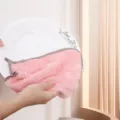 Detail view of the pink coral fleece dish towel wiping a plate, showing soft and absorbent texture. - 25*25cm / Beige