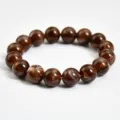 Braccialetto con perline marron marmorizzate da donna, elegante gioiello elastico da 12 mm. - Sfera da 12mm / Occhio Di Tigre Marrone