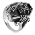 Detailed close-up of the gothic punk skull coffin men ring, showing exquisite carved textures. - Size 7 / Steel