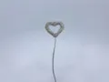 Close up detail of rhinestone heart balloon car ornament with sparkling crystal studs. - White Heart