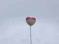 Close-up detail shot of the sparkling rhinestone heart balloon car interior ornament pin. - Pink and White Gradient Hearts