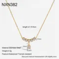 Detail view of luxury teardrop cubic zirconia stainless steel gold necklace details. - Three-Stone Water Drop Pendant (NXN382)