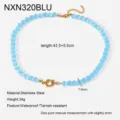 Dettaglio collana perle occhio di gatto blu in acciaio inox con lunghezza 43.5cm e perle da 7.8mm. - Blu (NXN320BLU)