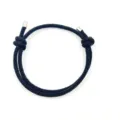 Handmade black woven rope adjustable bracelet detail, minimalist couple wristband accessory. - Black