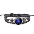 Pulsera trenzada de cuero negro con dije cabujón de vidrio del signo zodiacal Escorpio - Escorpio Brilla